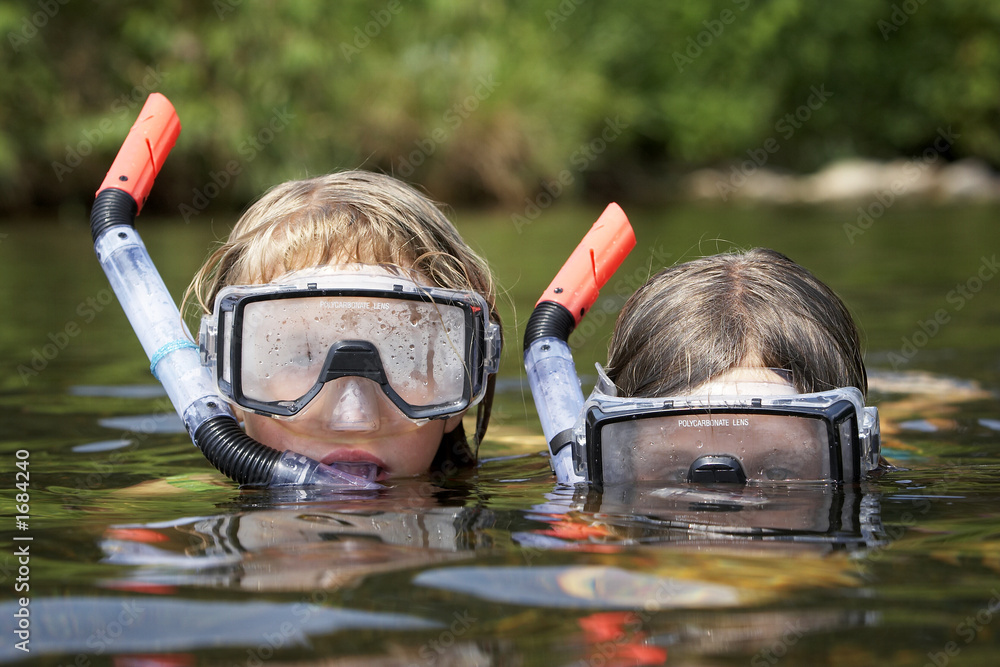 Fototapeta premium two kids playing in the water