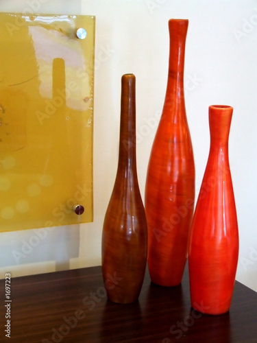 three red vases