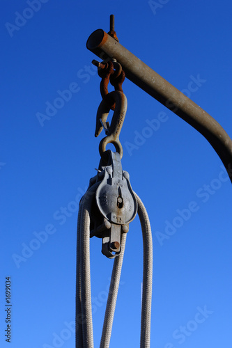 pulley on pole on fishing pier