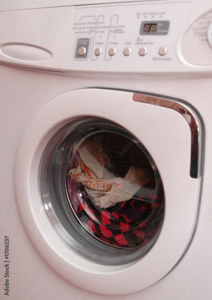 working washing machine with clothing working washing machine with clothing