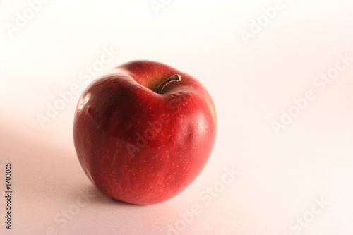 red ripe apple on white backrgound