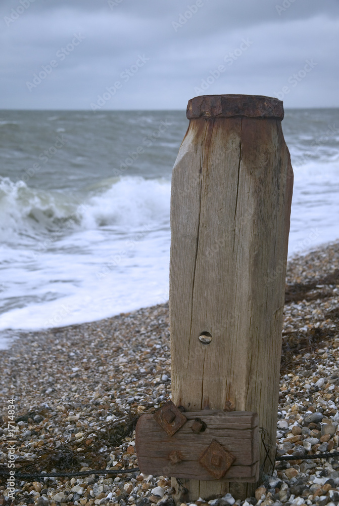 Fototapeta premium groyne on stone beach
