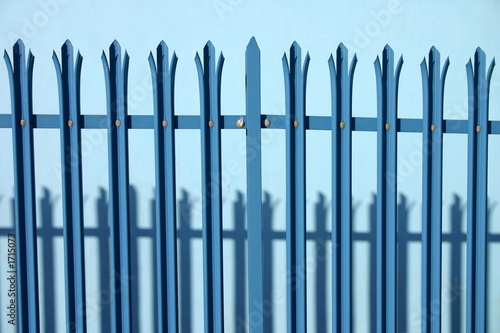 blue metal fence.