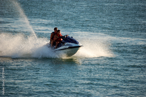 woman and man on a jetski