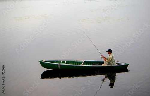 Fotografiet photo pêcheur dans un bateau