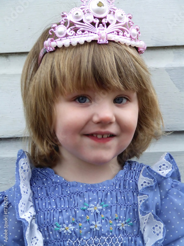 close up of baby in tiara photo