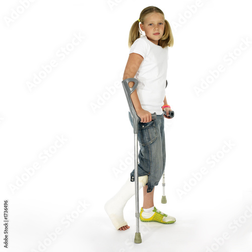 girl with a broken leg walking on crutches