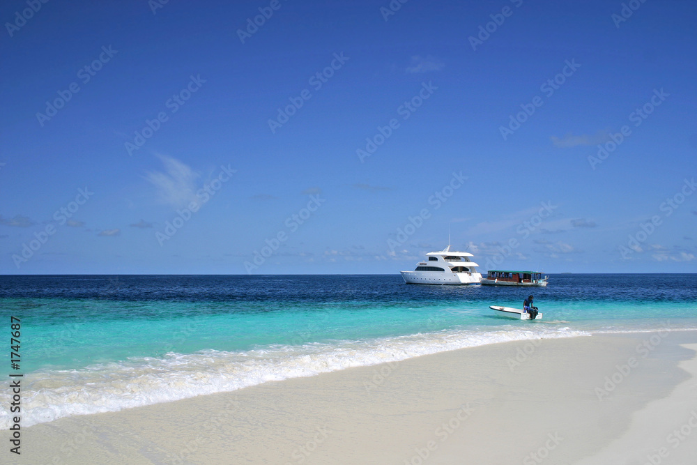 maldives ( white boat and sand beach)