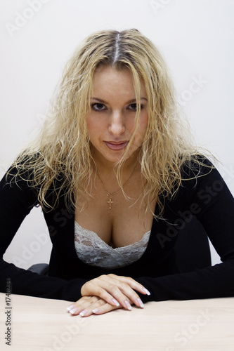 sexy blond woman in office