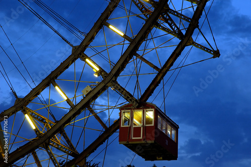 fragment og giant ferris wheel under dramatic sky