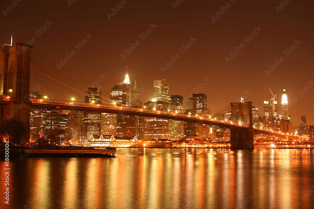 Obraz premium brooklyn bridge and manhattan skyline at night