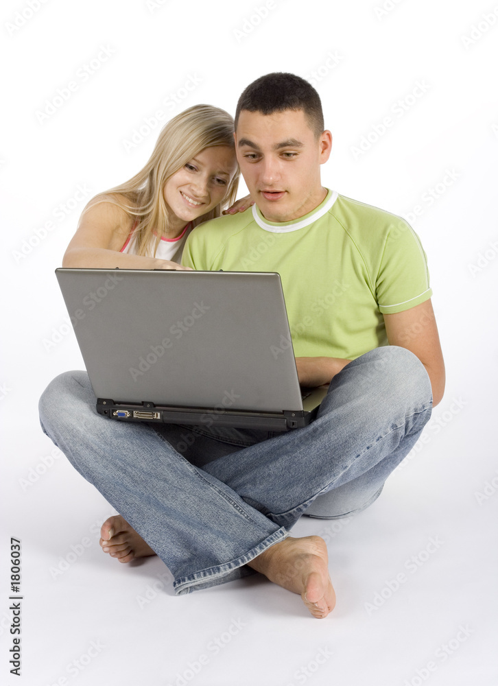 surprised young couple with laptop