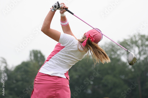 golf swing at finish lady