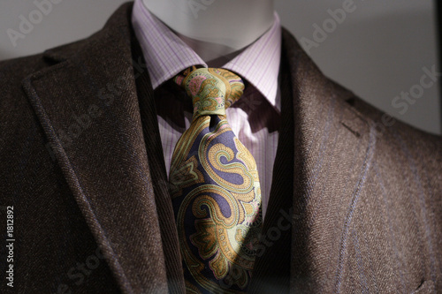 brown coat, pink shirt, tie