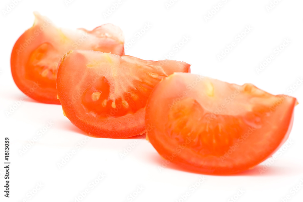 tomato slices, lobules on the white