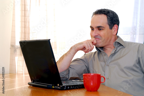 man with laptop photo