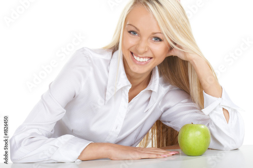 the beautiful girl and a green apple