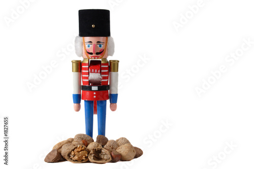 nutcracker soldier with pile of nuts