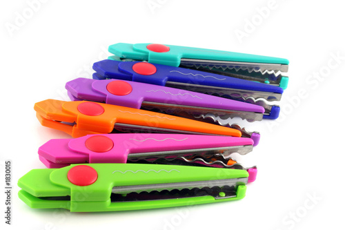 brightly colors craft scissors on a white background