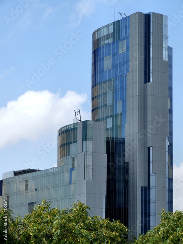 modern skyscraper and trees