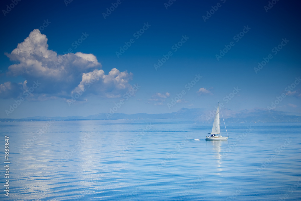 sailing boat at an open sea