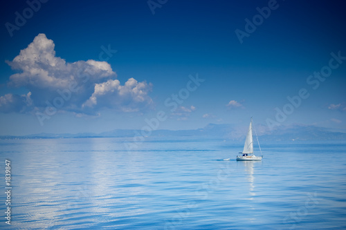 sailing boat at an open sea