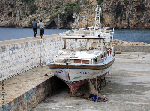 fishing boat at the quayside of the old harbour in