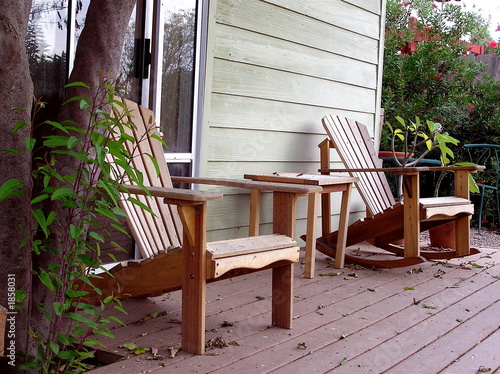 two chairs on porch