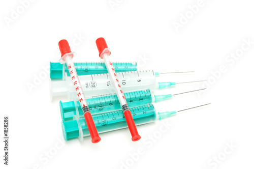 selection of syringes isolated on the white