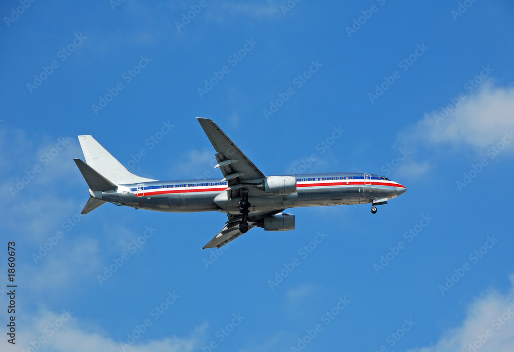 Fototapeta premium modern passenger jet at takeoff