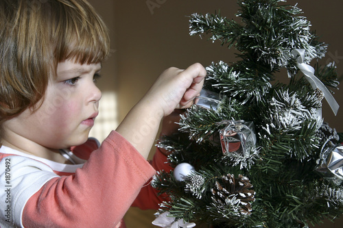 child and christmas tree
