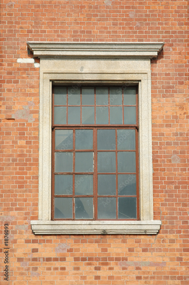 old window in brick wall