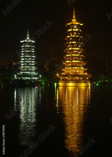 twin pagodas with reflection