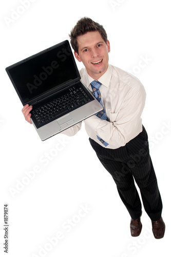 businessman holding laptop, smiling