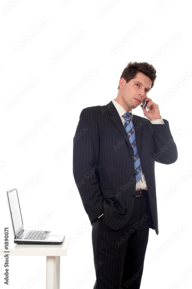 businessman using a mobile phone, standing next to businessman using a mobile phone, standing next to