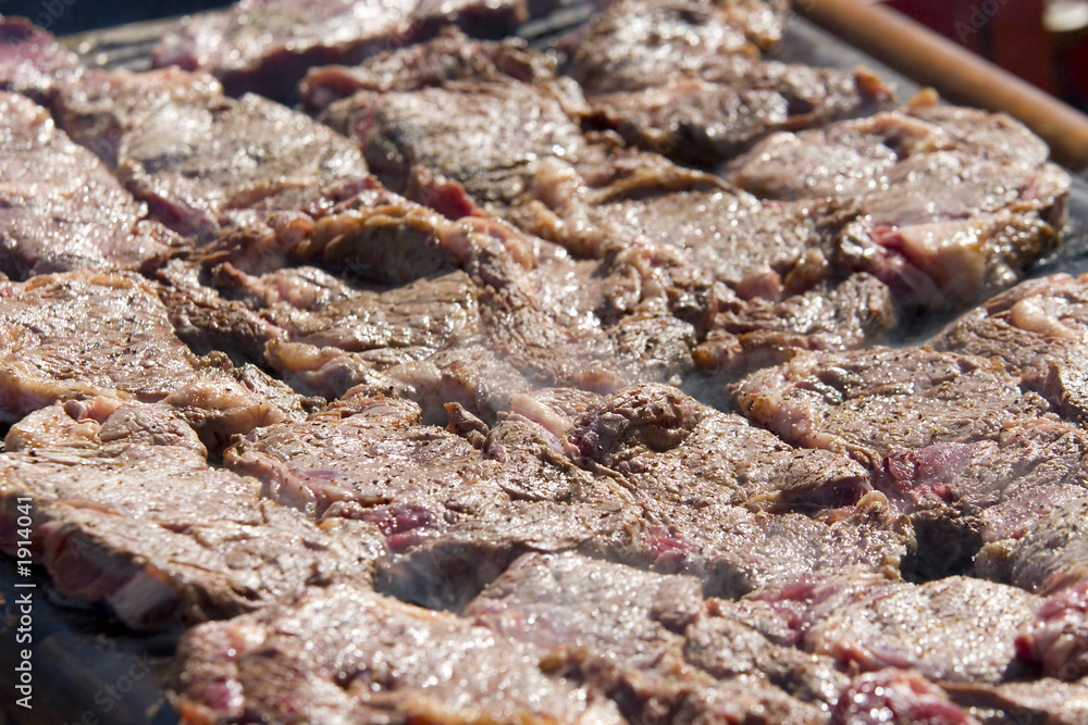 sizzling steak on a barbecue