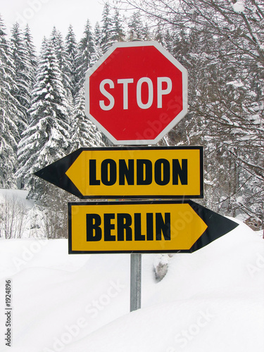 london or berlin? roadsign in nature photo