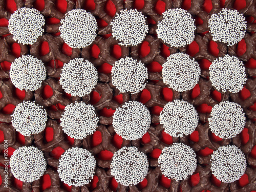  nonpareils and dark chocolate pretzels on red