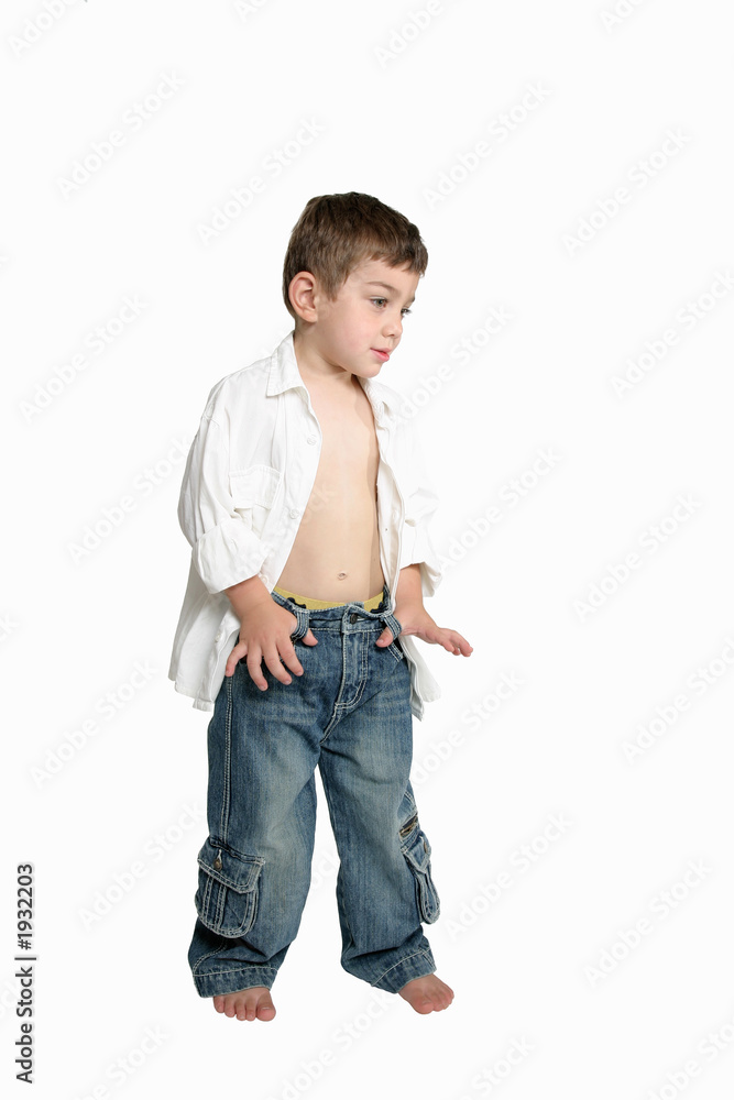 child with hands in jeans child with hands in jeans