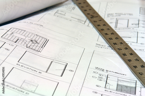 blue print building plans with ruler