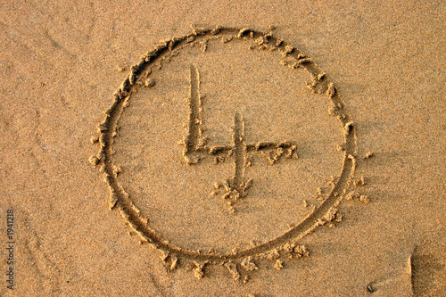 the number 4 written on the beach.  part of a coun