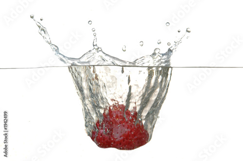 strawberry drop into water