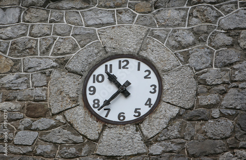 Wallpaper Mural clock in a stone wall Torontodigital.ca