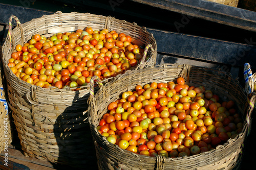 tomatoes in cane baskets
