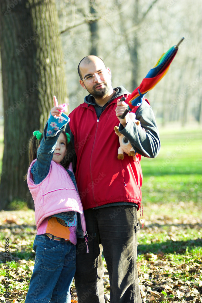 Naklejka premium little pretty child and father