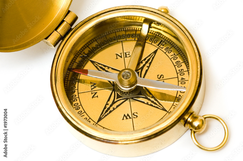 old style brass compass on white background