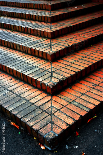 a red brick steps after rain