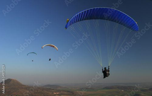 paragliding, three paraglids