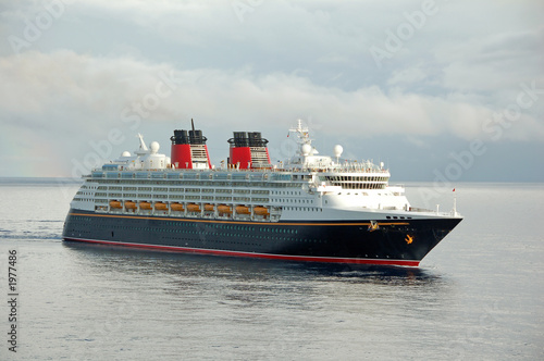 modern cruise ship approaching port of call photo
