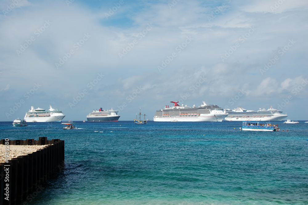 four cruise ships and a pirate ship